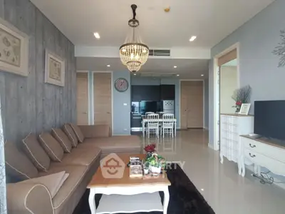 Luxurious living room with elegant chandelier and modern decor