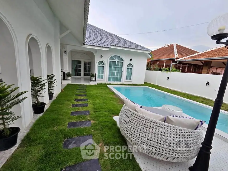 Luxurious villa with private pool and lush garden, perfect for relaxation and entertainment.