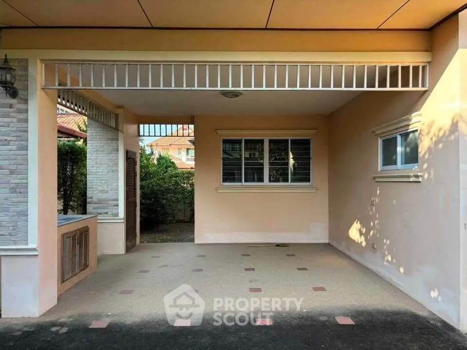 Spacious covered parking area in modern residential property