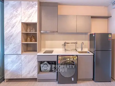 Modern kitchen with sleek appliances and stylish cabinetry