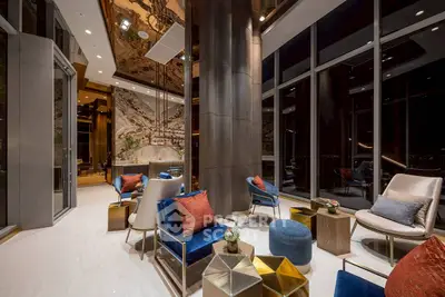 Luxurious modern living room with panoramic city views and elegant decor.