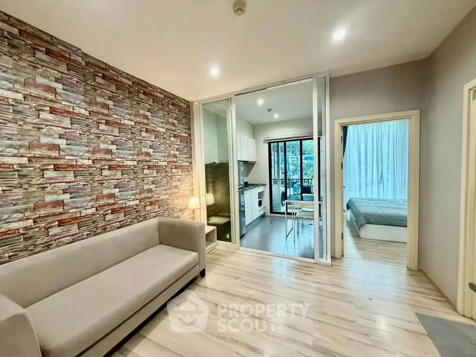 Modern apartment interior with open layout, stylish living room, and cozy bedroom view.