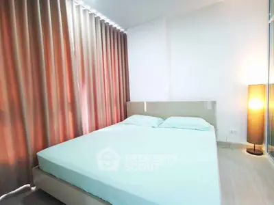 Modern bedroom with minimalist design and soft lighting