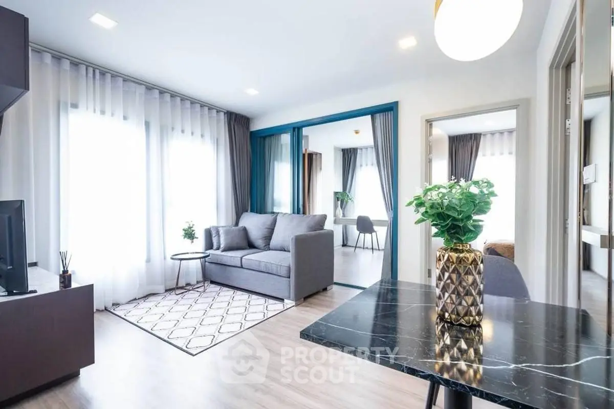 Bright modern living room with stylish decor and natural light