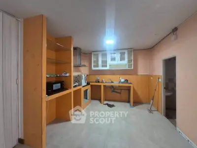 Spacious kitchen with open layout and modern appliances, ideal for culinary enthusiasts.