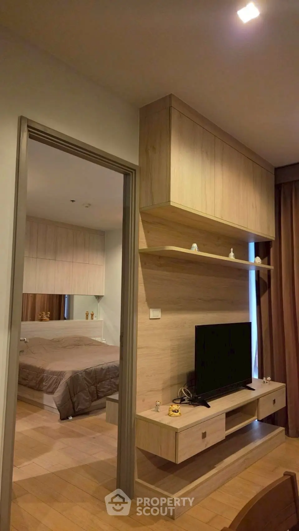 Modern apartment interior with cozy bedroom and stylish living area