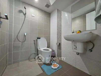 Modern bathroom with sleek fixtures and stylish tile design