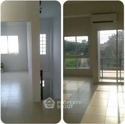 Spacious sunlit room with large windows and balcony access, perfect for modern living.