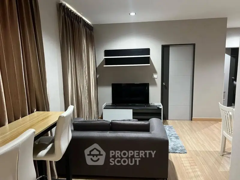 Modern living room with sleek furniture and cozy ambiance