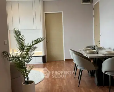 Modern dining area with elegant table setting and stylish decor