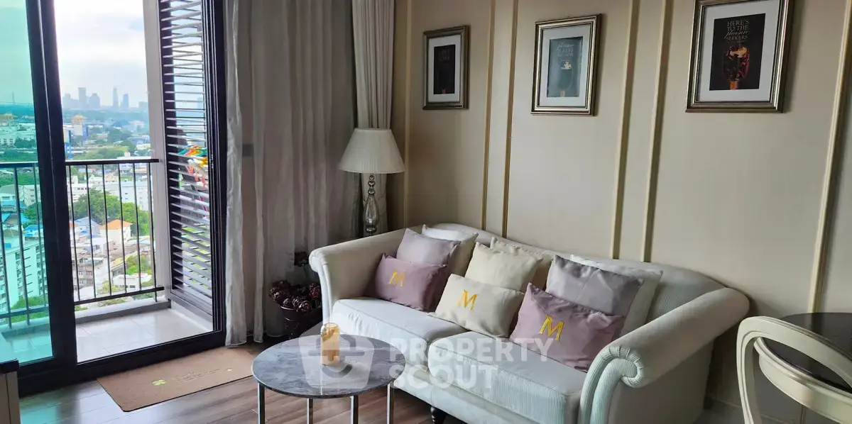 Chic living room with cozy sofa and city view balcony in modern apartment