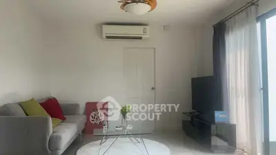 Modern living room with air conditioning and stylish decor