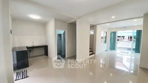 Spacious open-plan living area with modern finishes and ample natural light.