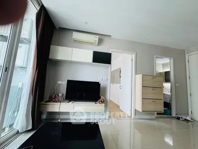 Modern living room with sleek TV setup and stylish storage solutions