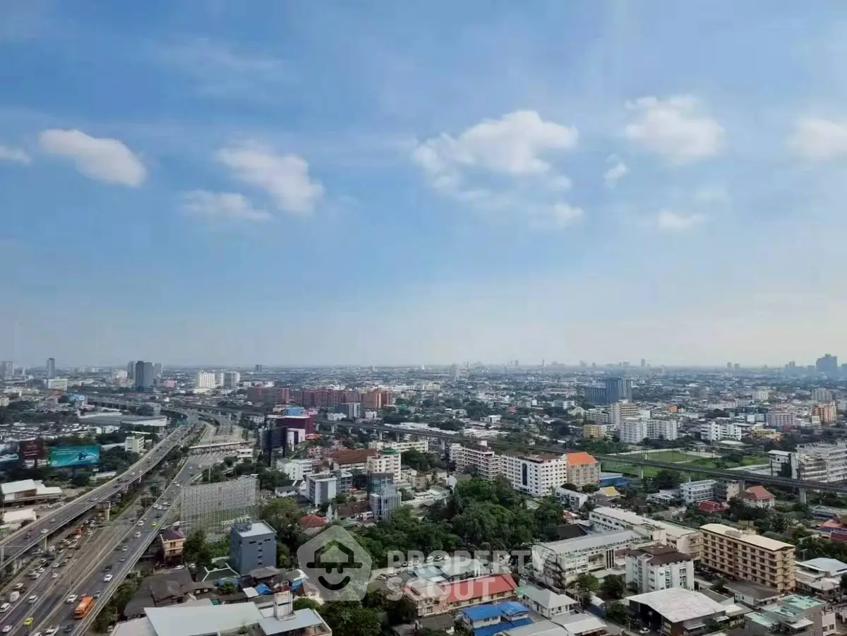 Stunning cityscape view from high-rise building showcasing urban skyline and vibrant city life.