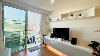 Modern living room with balcony view and stylish decor