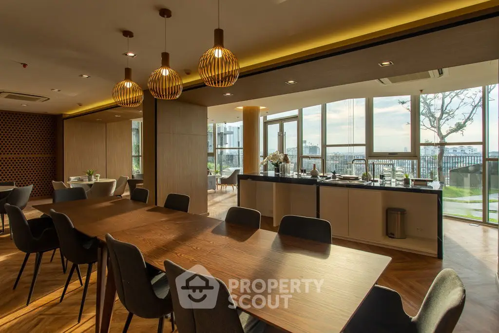 Luxurious dining area with modern decor and panoramic garden view.