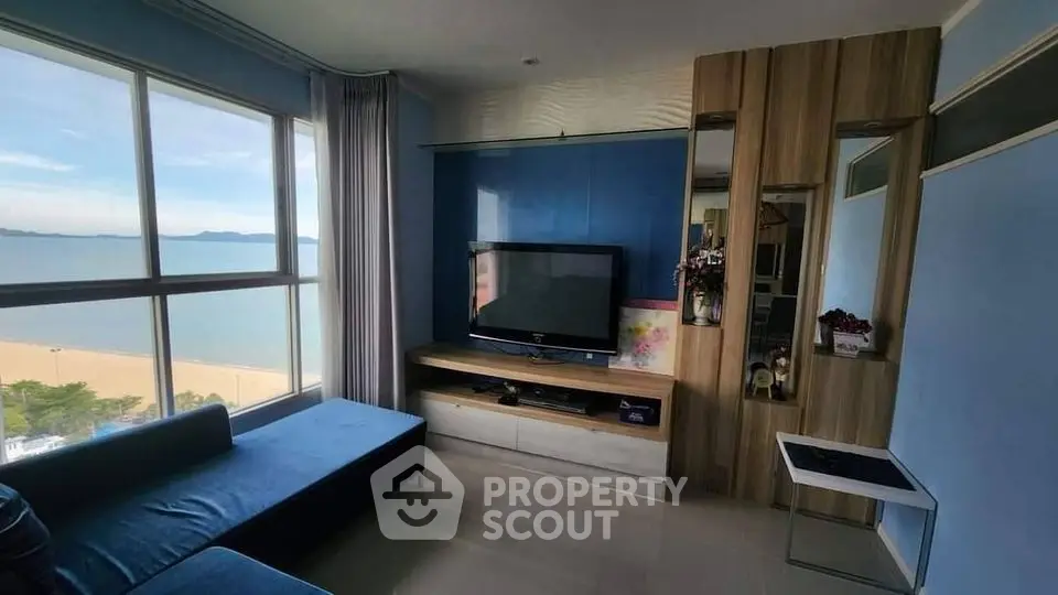 Modern living room with stunning ocean view and sleek furniture