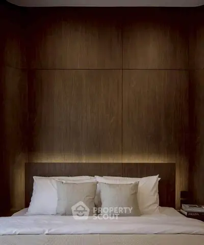 Luxurious bedroom with elegant wood paneling and soft ambient lighting