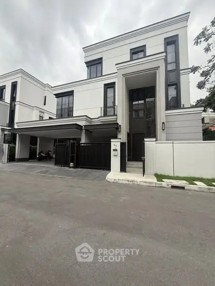 Modern luxury home with sleek design and spacious driveway