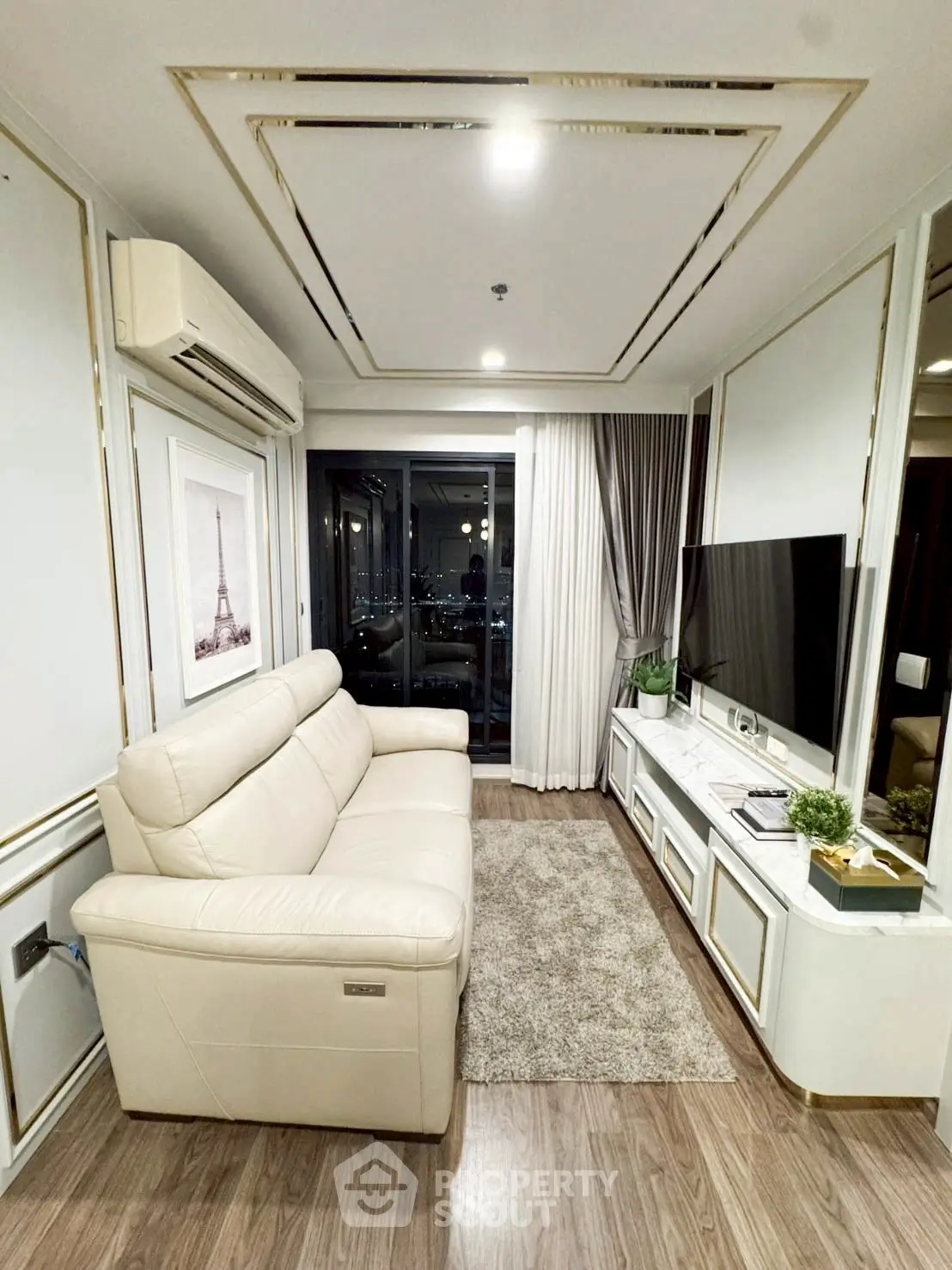 Luxurious living room with elegant decor and stunning city view