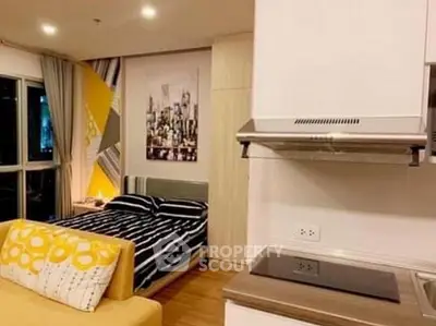 Modern studio apartment with stylish decor and open layout in urban setting.