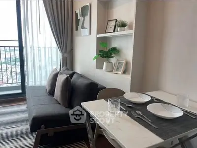 Modern living room with balcony view and stylish dining area