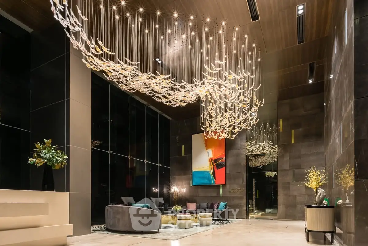 Luxurious modern living room with stunning chandelier and elegant decor