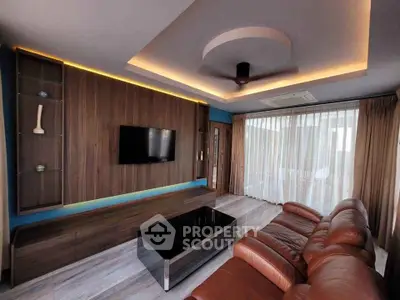 Luxurious living room with modern decor and leather sofa