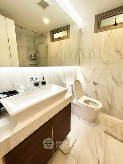 Luxurious bathroom with elegant marble tiles and modern fixtures