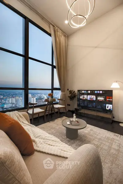 Luxurious living room with stunning city view and modern decor