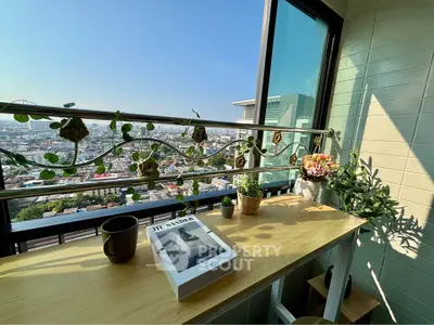 Charming balcony with city view, perfect for relaxation and enjoying the skyline.