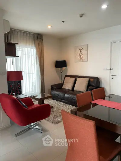 Stylish living room with modern furniture and elegant decor in a cozy apartment.