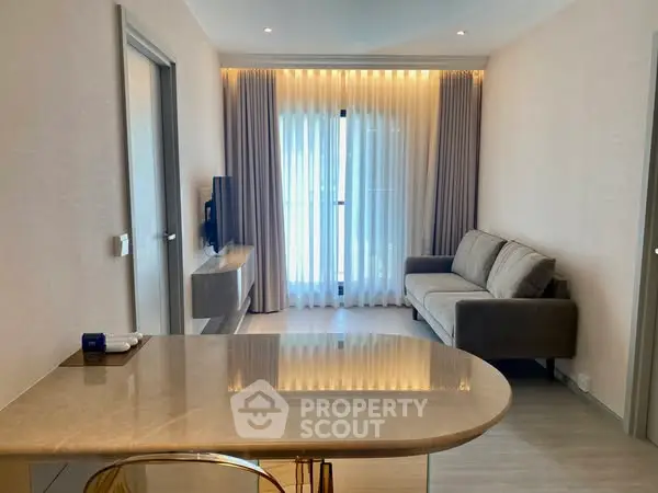 Modern living room with elegant decor and natural light