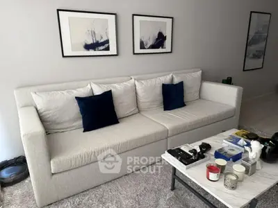Modern living room with stylish sofa and contemporary art decor