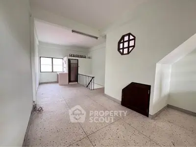 Spacious interior with unique window design and open layout, ideal for customization.