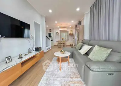 Spacious modern living room with elegant decor and cozy seating area