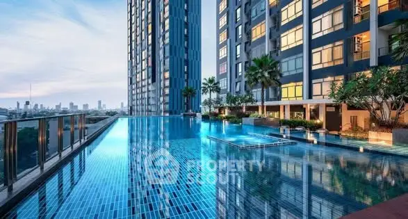 Luxurious high-rise apartment with stunning rooftop pool and city skyline view.