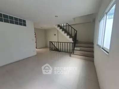 Spacious interior with staircase, ideal for modern living