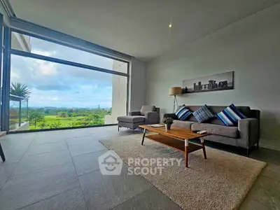 Spacious living room with panoramic view and modern decor