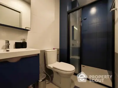 Modern bathroom with sleek shower and contemporary fixtures