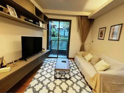 Cozy living room with modern decor and garden view balcony