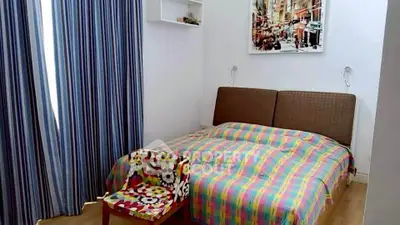 Cozy bedroom with colorful bedding and modern decor