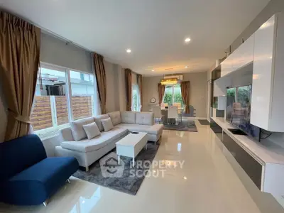 Spacious modern living room with elegant decor and natural light