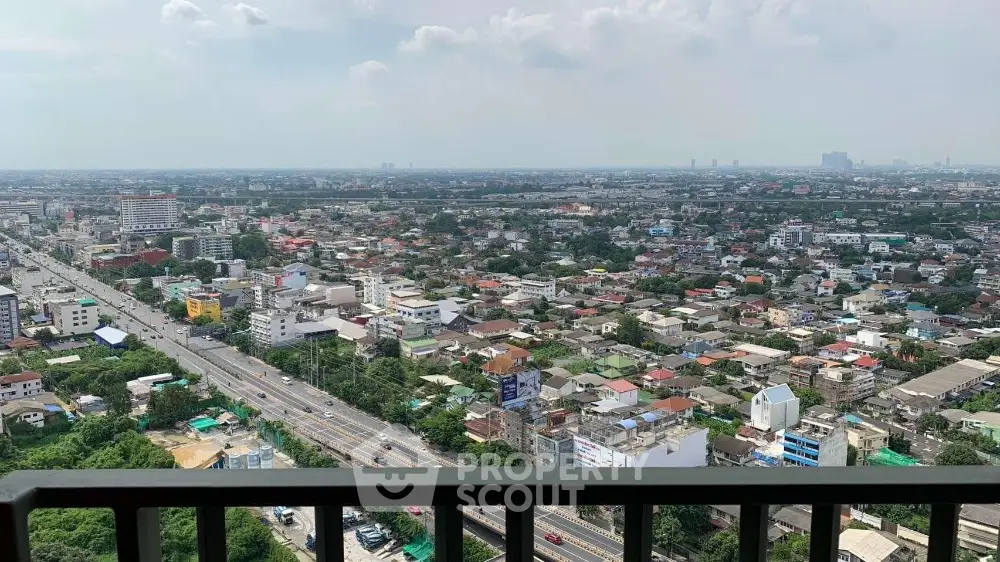 Stunning panoramic city view from high-rise balcony, perfect for urban living enthusiasts.