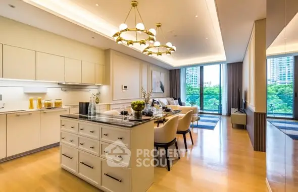 Luxurious open-plan kitchen and living area with elegant lighting and large windows offering a scenic view.