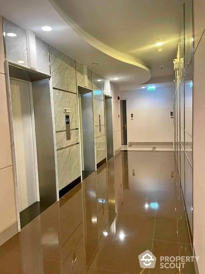 Modern building elevator lobby with sleek design and polished floors