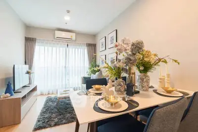 Stylish living room with elegant dining area and modern decor