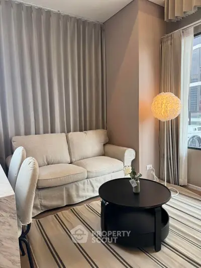 Cozy living room with modern decor and natural light