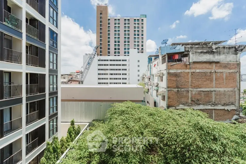 Urban cityscape view with modern buildings and lush greenery